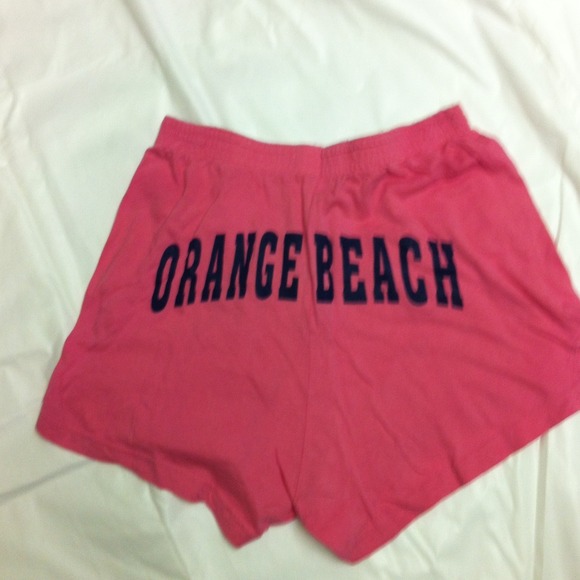 Orange beach athletic shorts size med.
