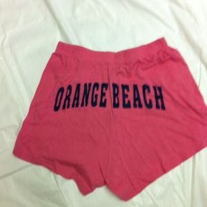 Orange beach athletic shorts size med.