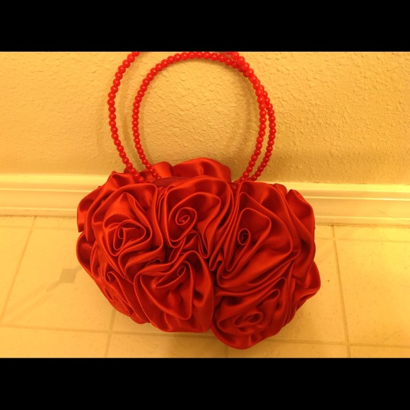 Red silk evening clutches