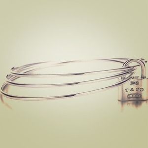 Authentic Tiffany bangle with removable lock