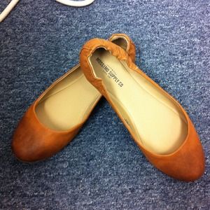 Brown faux leather flats!