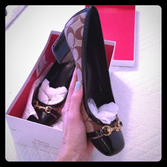 Coach cap toe pumps