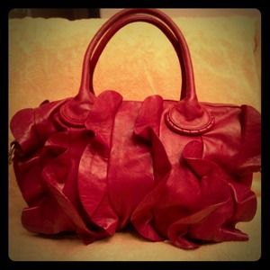 Beautiful ruffle Steve Madden bag.