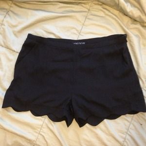 Black scalloped edge shorts, flowy, pockets. NWT