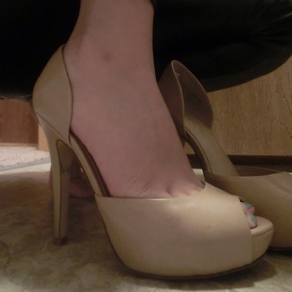 Aldo nude open-toe pumps.