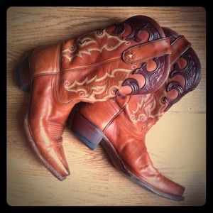 A true cowgirl must! Tony Lama western boot .