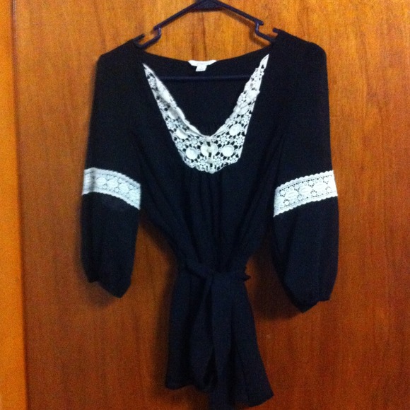 Black and white shirt with tie at waist