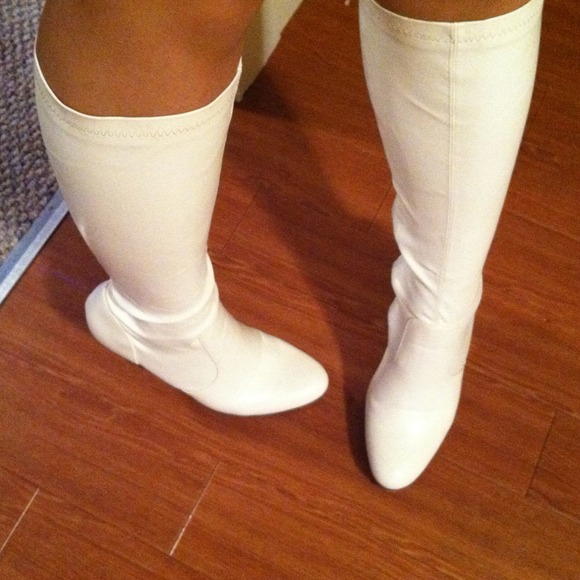 White knee high boots