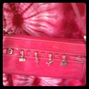 Cute pink charm purse.
