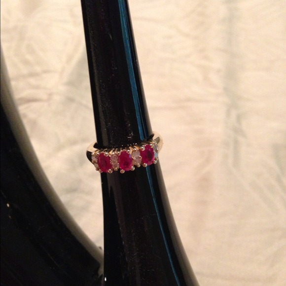 Genuine ruby and diamond yellow gold ring