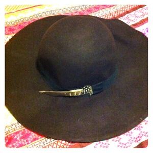 Brown felt hat.