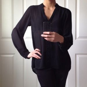 Sheer black blouse