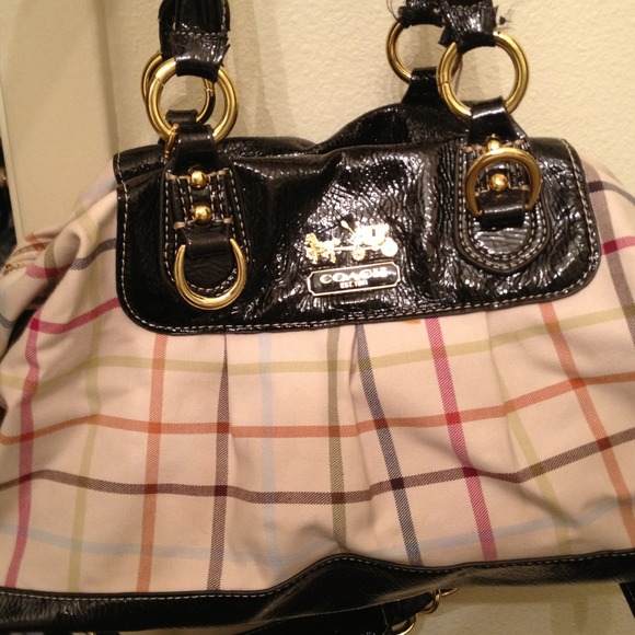 Authentic coach *traded