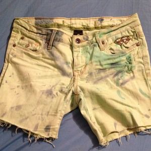 Studded and acid washed denim shorts