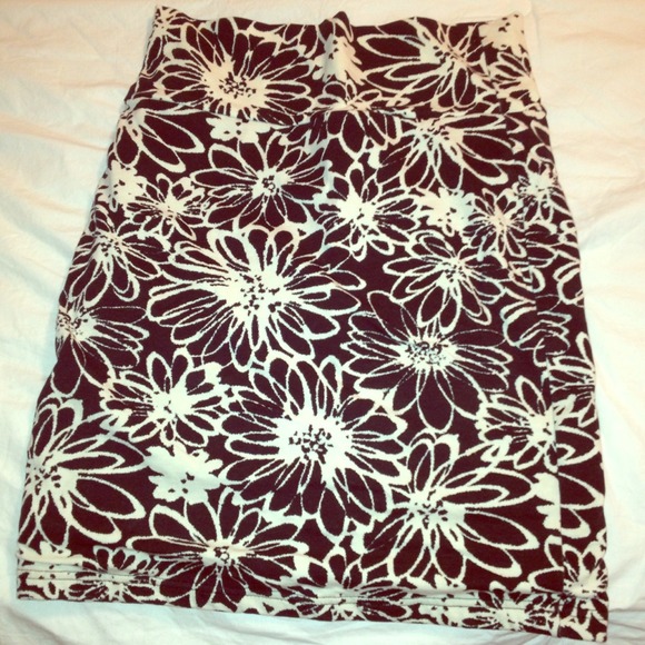 Black pencil skirt with floral design.