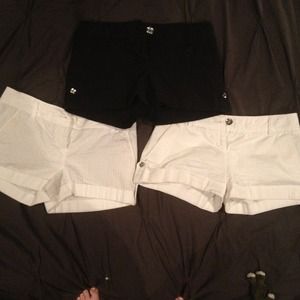 3 pairs of Express brand shirts. Size 2!