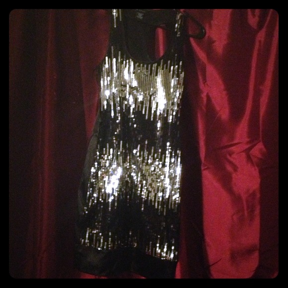 Sequined little black dress