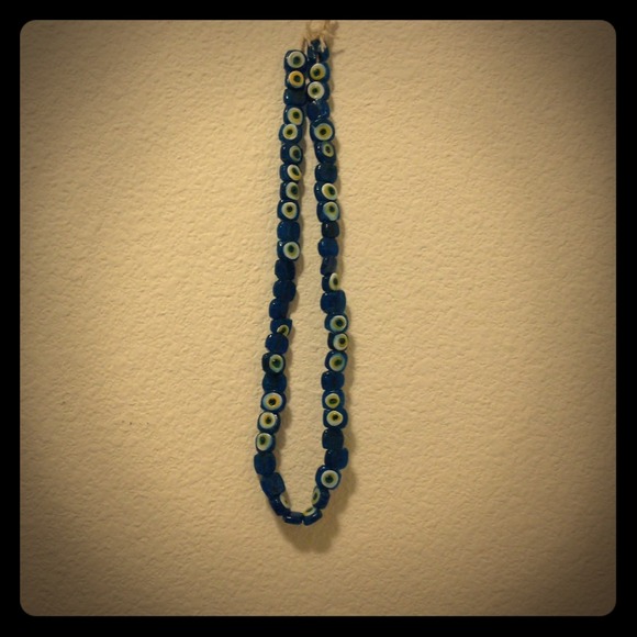 Evil eye necklace.
