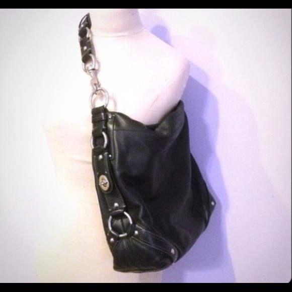 RESERVED. Authentic large Coach Carly Hobo