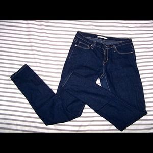 Dark wash skinny jeans by Forever21