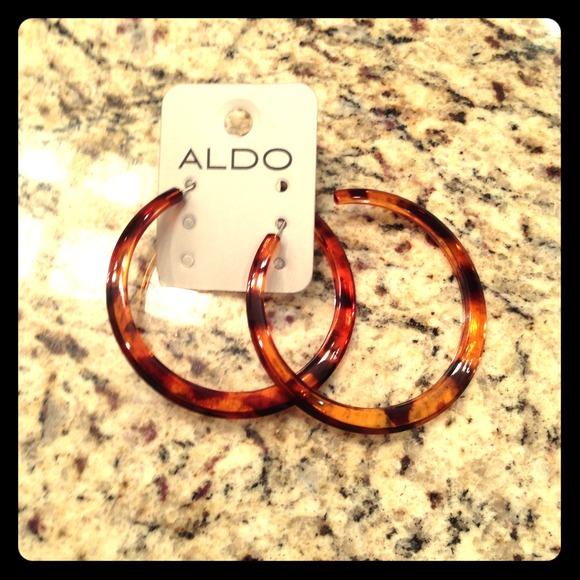 Tortoise Hoop Earrings by Aldo. Brand new