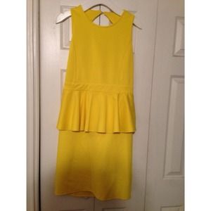Yellow backless peplum dress.