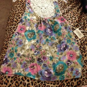 Floral tank.