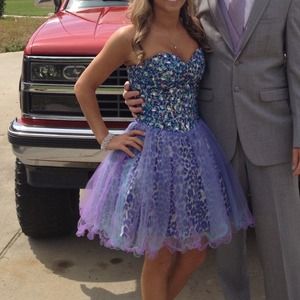 Im selling this dress because i have no use for it