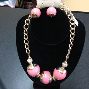 Goldtone and coral necklace and earring set