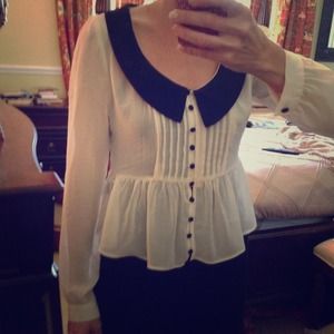 NWT ivory and black peplum top. S and L available