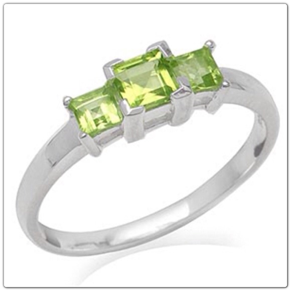 Brand new Birth Rings Peridot & Garnet sterling