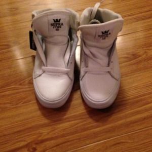 White Supra Mid Top Sneakers