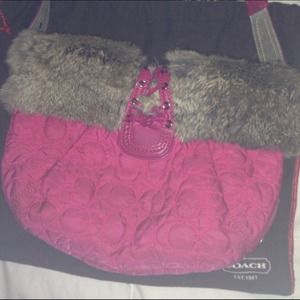 Authentic pink  coach down purse.