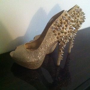 Gold,glitter and spiked heels