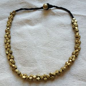 Gold multifaceted bead necklace