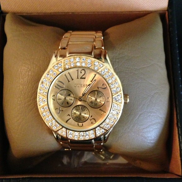 Gold Guess Fashion Watch.
