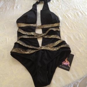 Super sexy one piece with snakeskin print.