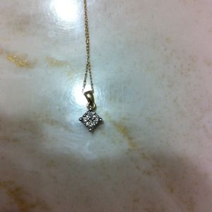 10K Gold chain with diamond pendent.
