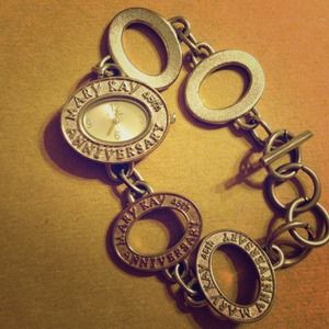 Silvertone Mary Kay anniversary watch.