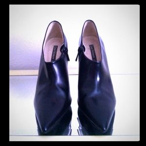 Black leather point booties