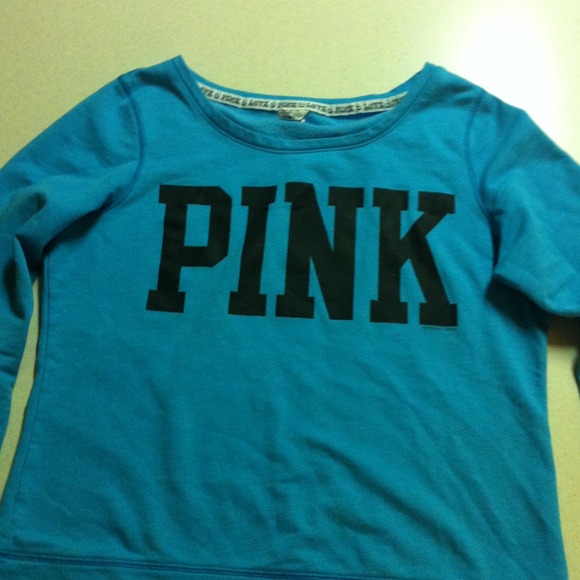 Pink sweater and Hurley purse