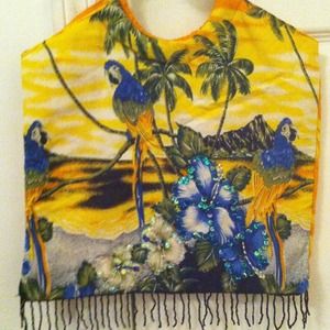 A colorful hand beach bag. Or simply for fashion.