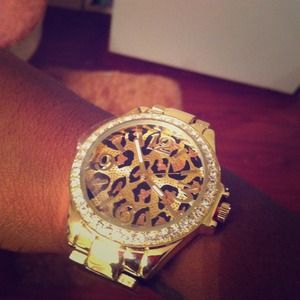 Watch w/ leopard print in the face.