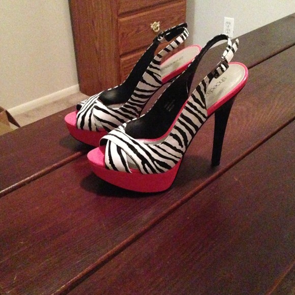 Pink and zebra heels.