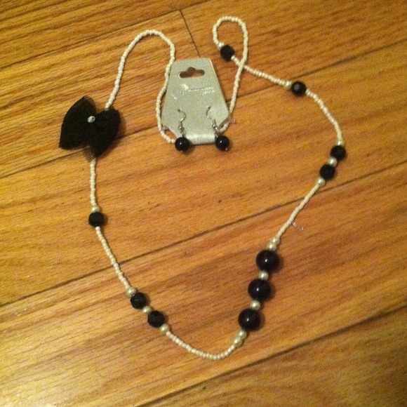 White and black necklace with matching earrings
