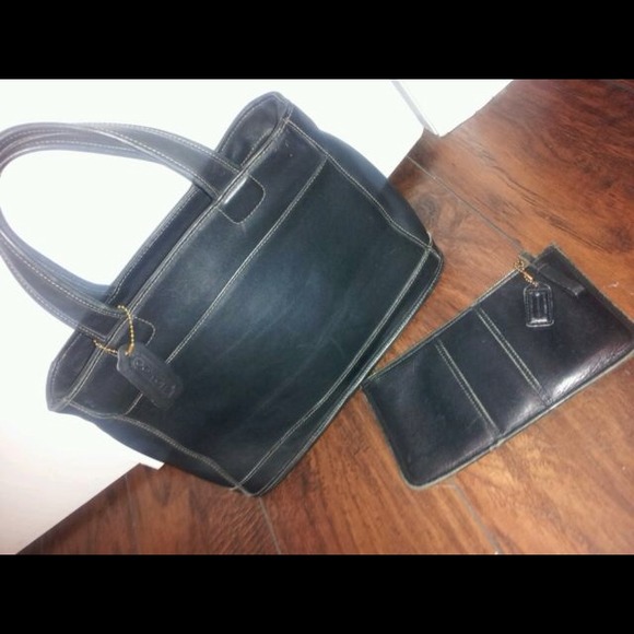 Sold-Authentic black leather coach