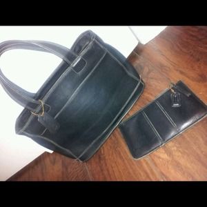 Sold-Authentic black leather coach