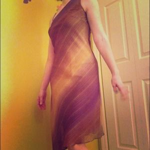 One shoulder gold and purple toned dress.