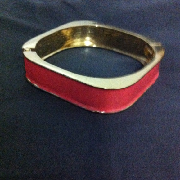 Costume jewelry-gold tone and coral bracelet.