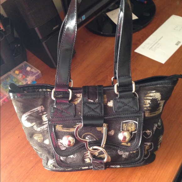 Black handbag with gold and silver hearts